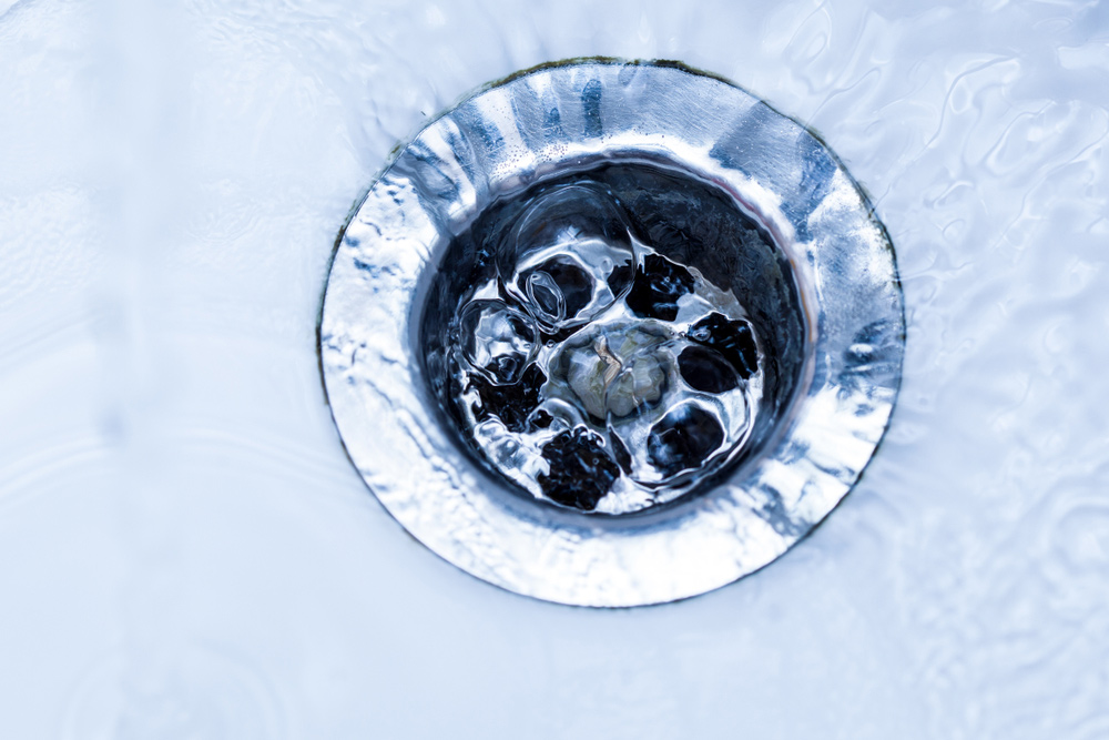 Close-up Of A Clogged Sink